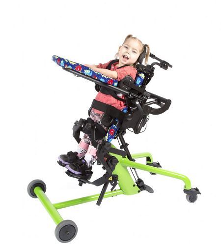 Bantam Stander in supine standing position - shows optional Foot Straps, Shadow Tray with Padded Tray Cover, Hip Supports, Lateral Supports, Positioning Belt, Push Handle, and Head Support
