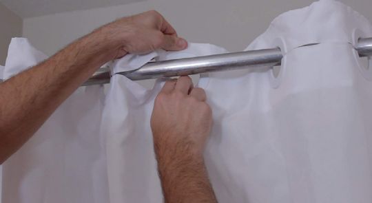 The Benchmate Split Shower Curtain uses a grommet system, eliminating the need for hard to install shower curtain hooks.