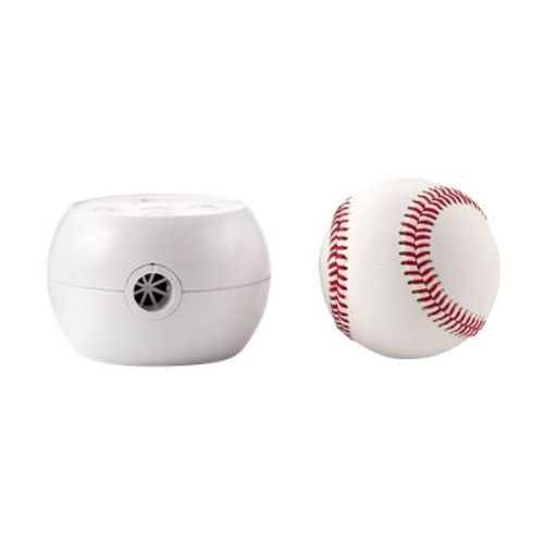 Sleeping machine sized next to a baseball to show the small size