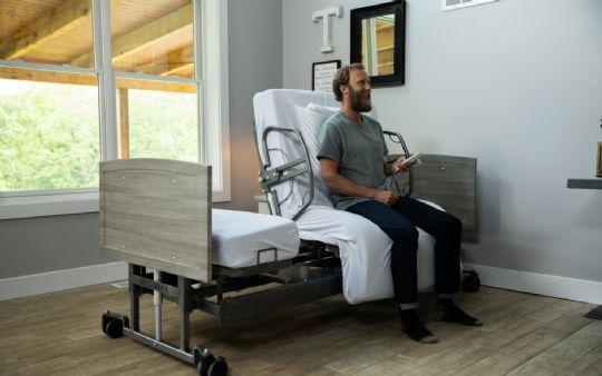 Standard ActiveCare Bed with upgraded side rails and sheets (the side rails and sheets are sold separately)