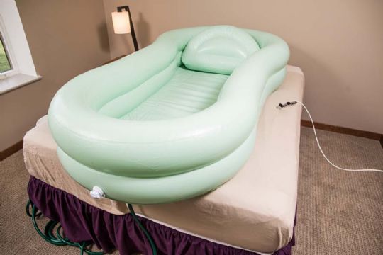 The EZ Bathe Inflatable Bed Bath fits all beds