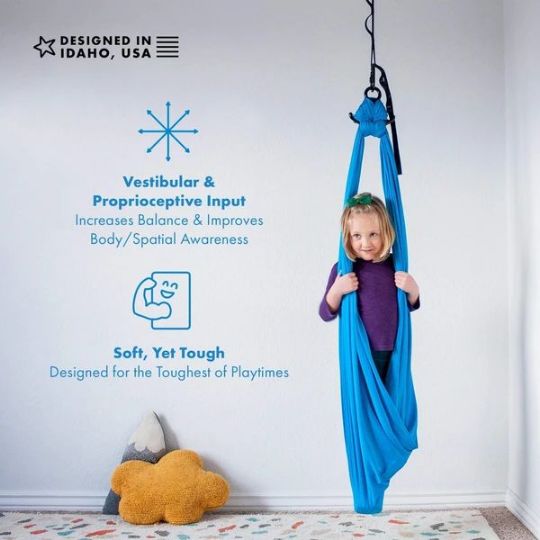 The Indoor Sensory Compression Swing promotes better balance and spatial awareness.