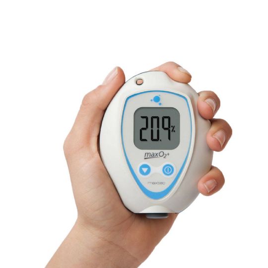 Maxtec MaxO2+A Oxygen Analyzer shown as it is able to fit in one's hand with comfort
