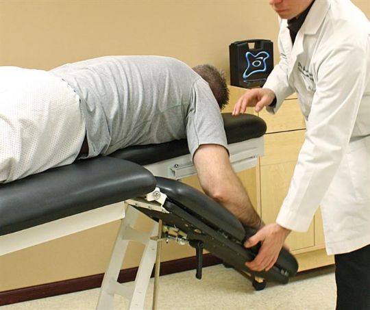 Leg and Shoulder Therapy Table in use