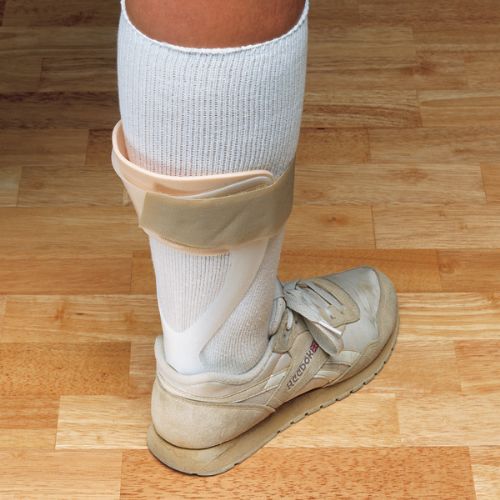 The foot orthosis fits inside the user's shoe as needed.