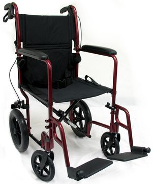 Red frame of the Ultra Light Weight Transport Wheelchair with flip up footrests.
