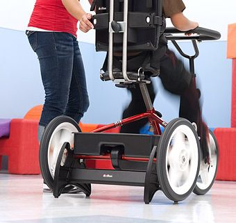 Stationary Stand with a Rifton Adaptive Tricycle