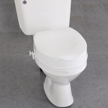  The lid is firmly attached with two L-shaped plastic brackets which make this raised toilet seat secure.