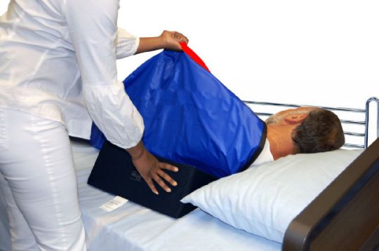 Since the 30 Degree Bed System with Slider Sheet and Two 16 inch Wedges uses a non-skid surface, the components remain in place while positioning patients on their side. 