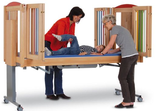 Outward opening doors give multiple caregivers easy access