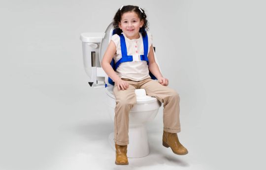 A contoured, orthopedic seat and buckled restraints to ensure that your child remains secure during toileting 