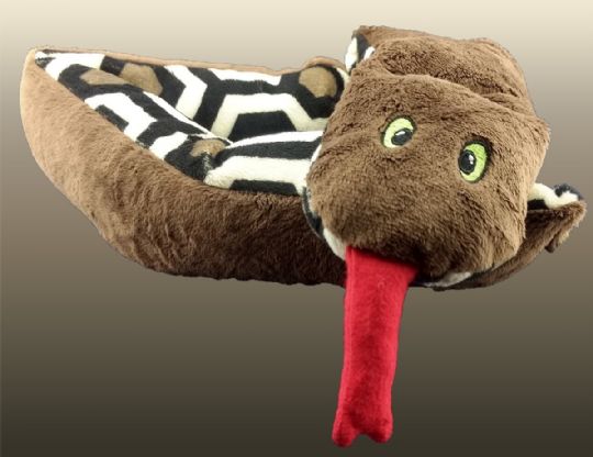 The Snuggle Snake has a brown plush top and soft geometric fabric on the bottom
