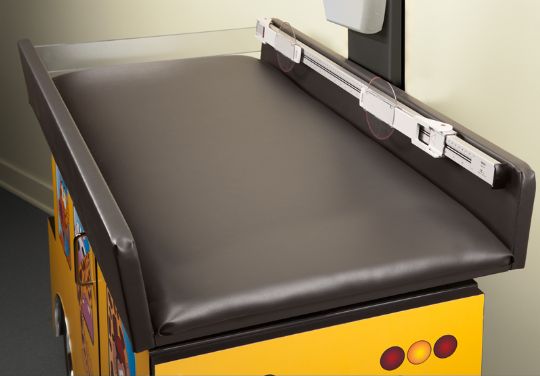 Padded examination table top