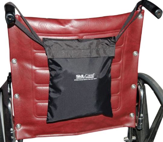 Convenient carrying case attaches to the back of a wheelchair. 