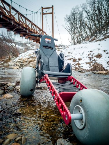 A standard wheelchair is great for sidewalks and floors, but it might not roll over tree roots, wet leaves, or snow. Emma X3 can.
