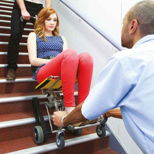 Safety in ascending and descending with no heavy lifting or carrying is the goal of this transport chair