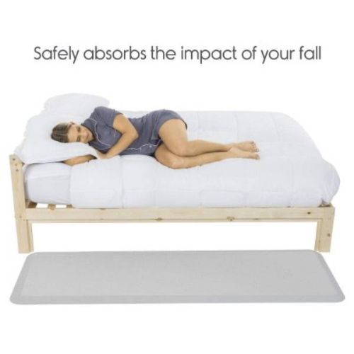 Picture shows how to use the mat next to the bed to prevent injuries from falling 