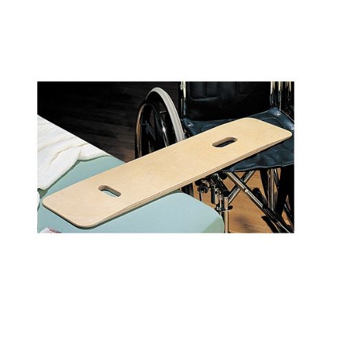 Hausmann Bariatric Wood Transfer Board shown in use to assist a wheelchair user into bed