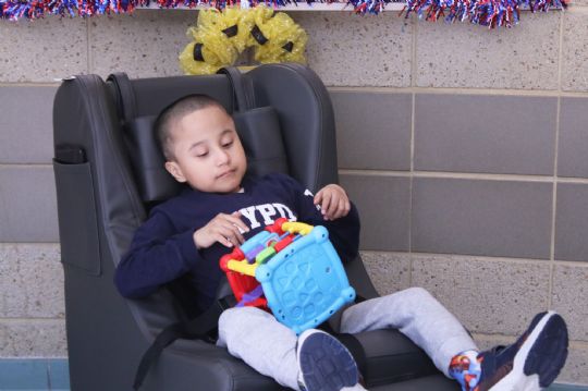 Rock'er Pediatric Positioning Chill Out Chair in use
