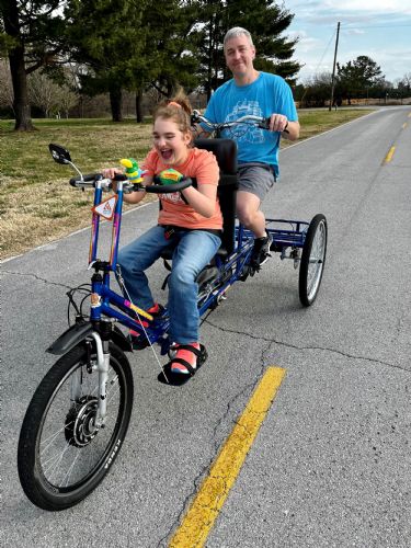Freedom Excursion Tandem Tricycle in candy blue color in Use