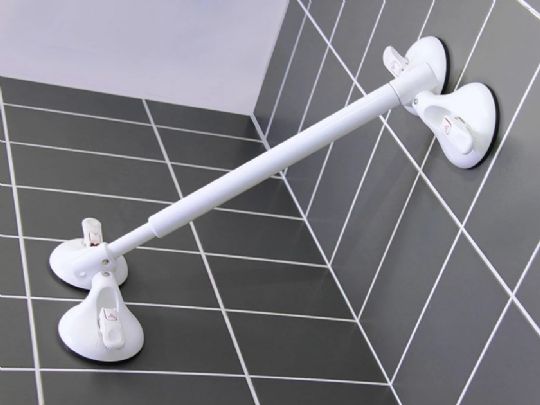QuattroPlus High Capacity Grab Bar Telescope installed in corner of shower wall