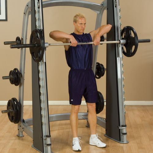 Arm lifts with the Pro Clubline Counter-Balanced Smith Machine