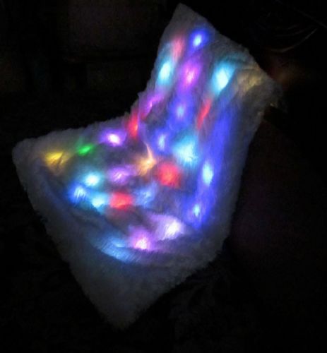 LED Multi-Sensory Light-Up Blanket shown in the dark