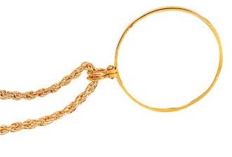 Includes chain for wearing around the neck. Pictured in Gold.