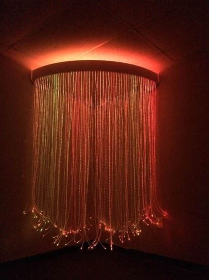 The LED fiber optic strands transition through hundreds of lively colors