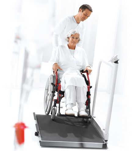 Caregivers may position the entire wheelchair on the scale, eliminating the need to get the patient up