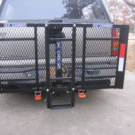 Electric EZ Carrier Platform secured flat against the vehicle when not in use