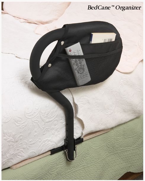 BedCane shown with organizer for easy storage of remotes and other bedside items.