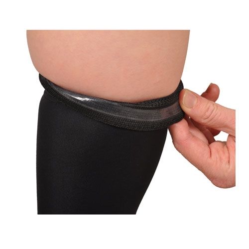 Elastic band keeps the Leg Orthosis Garment in place. Sizing Chart is Located Below