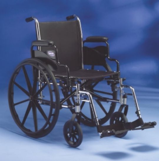 Invacare Tracer SX5 Wheelchair with optional footrests accessory.