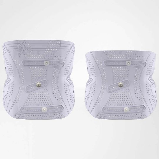 Perforated adjustable lumbar support shell for targeted back stabilization