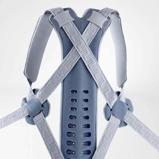 Features adjustable straps for spine stabilization and posture support 