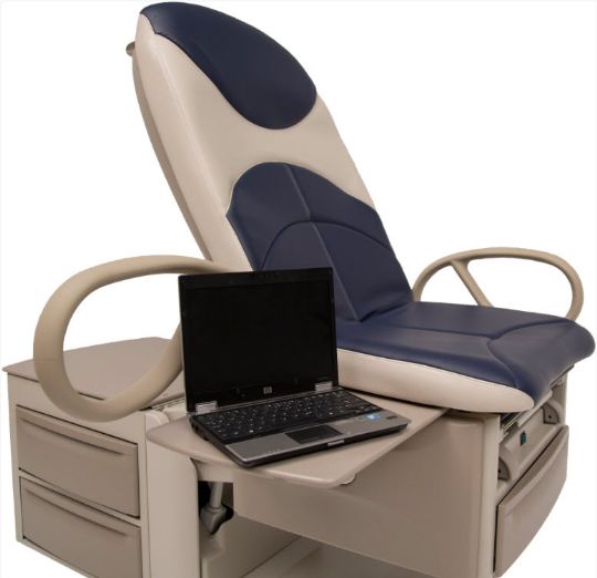 Brewer 6501 Access High-Low Exam Table shown with Laptop use and Plush Design 
