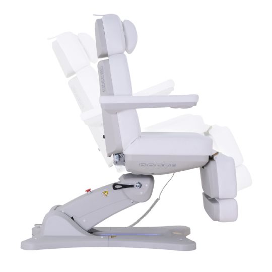 Motorized facial spa chair in an upright position with adjustable armrests and backrest