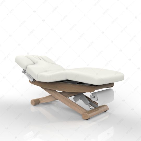 Adjustable spa massage table with a wooden x-frame and built-in paper holder