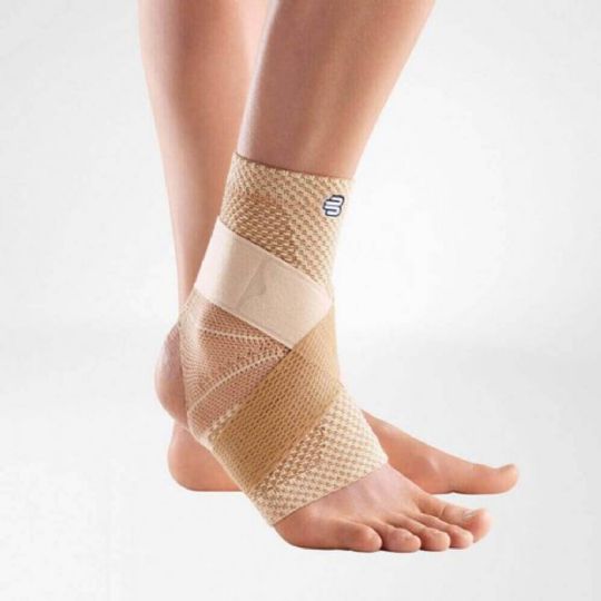 Beige ankle support with open heel for stability and comfort