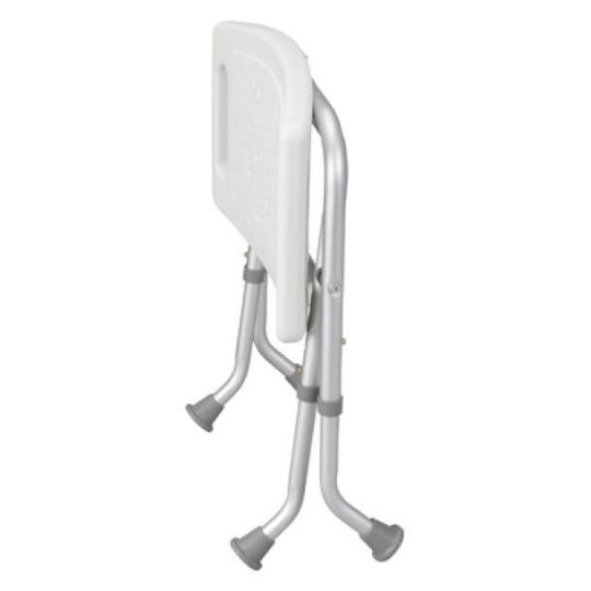 Foldable shower chair in compact, upright storage position