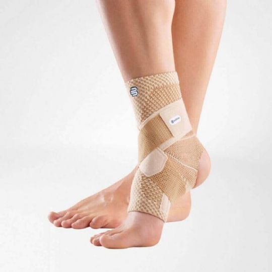 Ankle support with secure strap system and open heel design