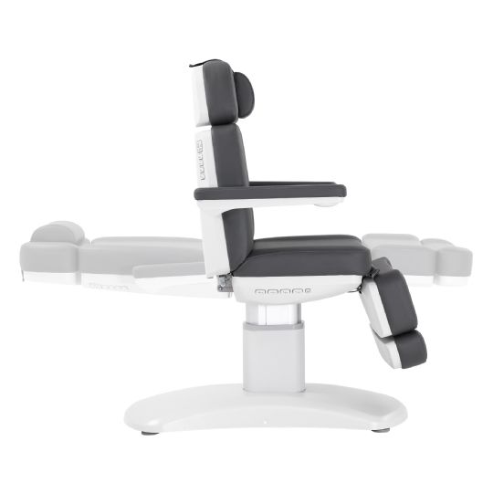 Facial chair with upright position, cushioned armrests, and adjustable footrest