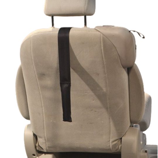 Rear view of lumbar support cushion strap attached to car seat