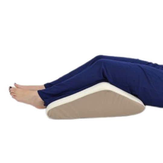 Comfortable knee lift cushion supporting legs and promoting relaxation