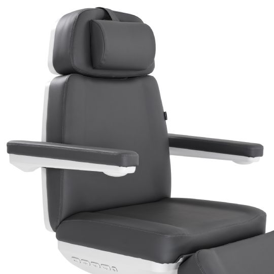 Close-up of the cushioned seat and adjustable armrests on the dark grey facial chair