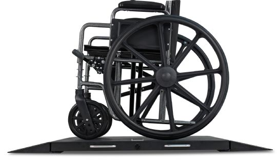 Side view of scale weighing wheelchair