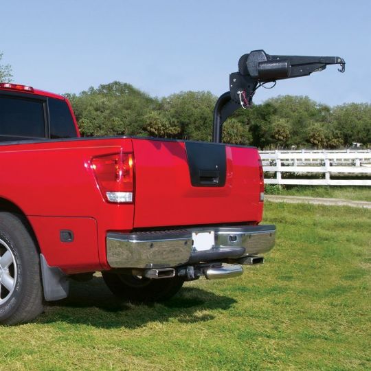 Triple Axis Scooter and Power Chair Truck Tailgate Lift sits at the end of your tailgate.
