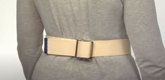 Adjust the Heavy-Duty Gait Belt from the back of the patient