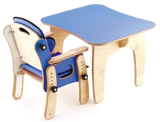 Pediatric PAL Classroom Seat pictured from behind and view of the optional table as well